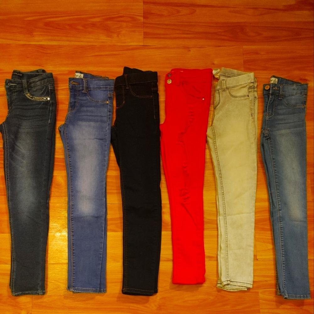 All new jeans for a girl never worn size 7 and 8